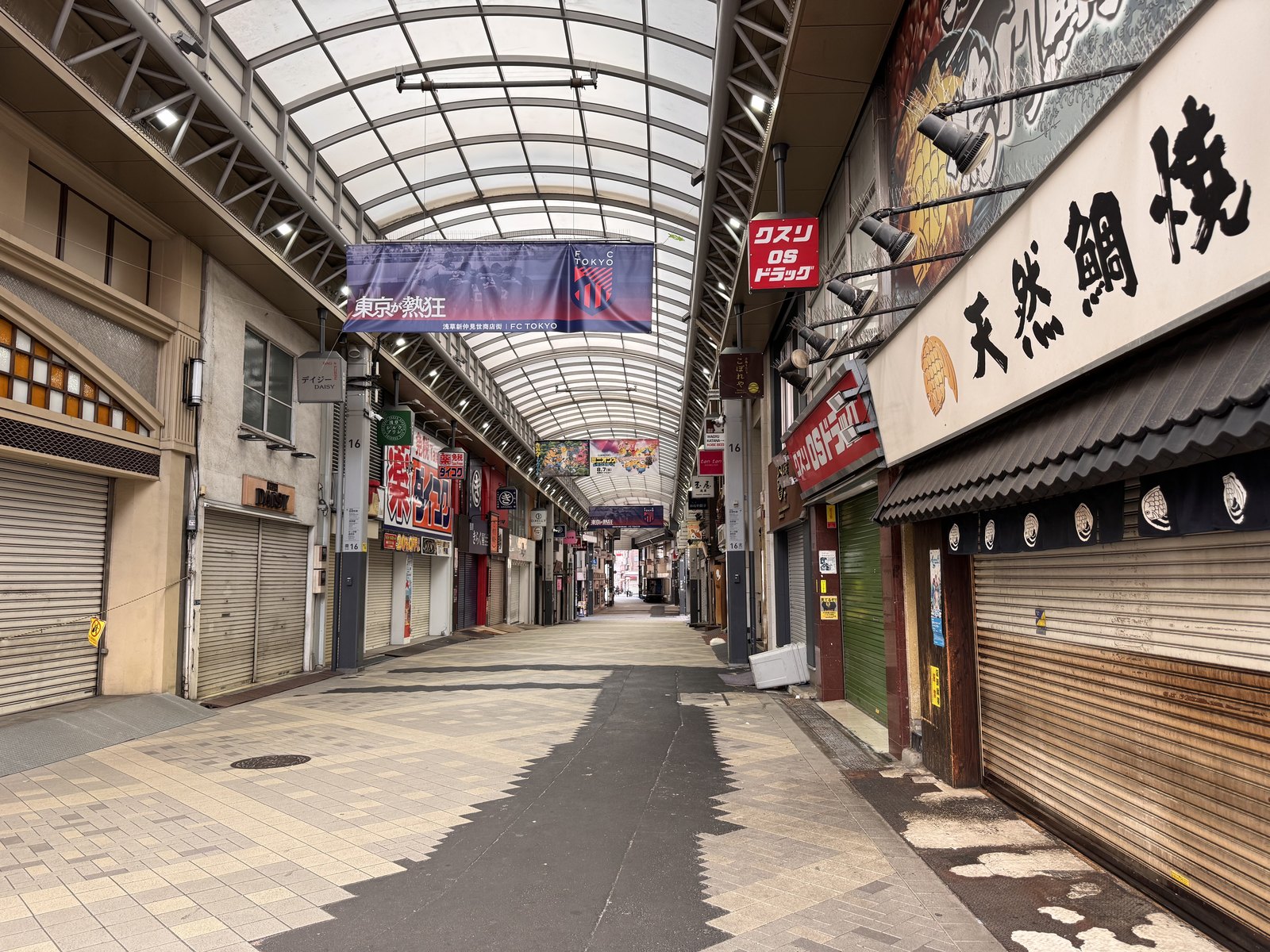 The Shin-Nakamise covered arcade in Asakusa, shuttered end to end early in the morning