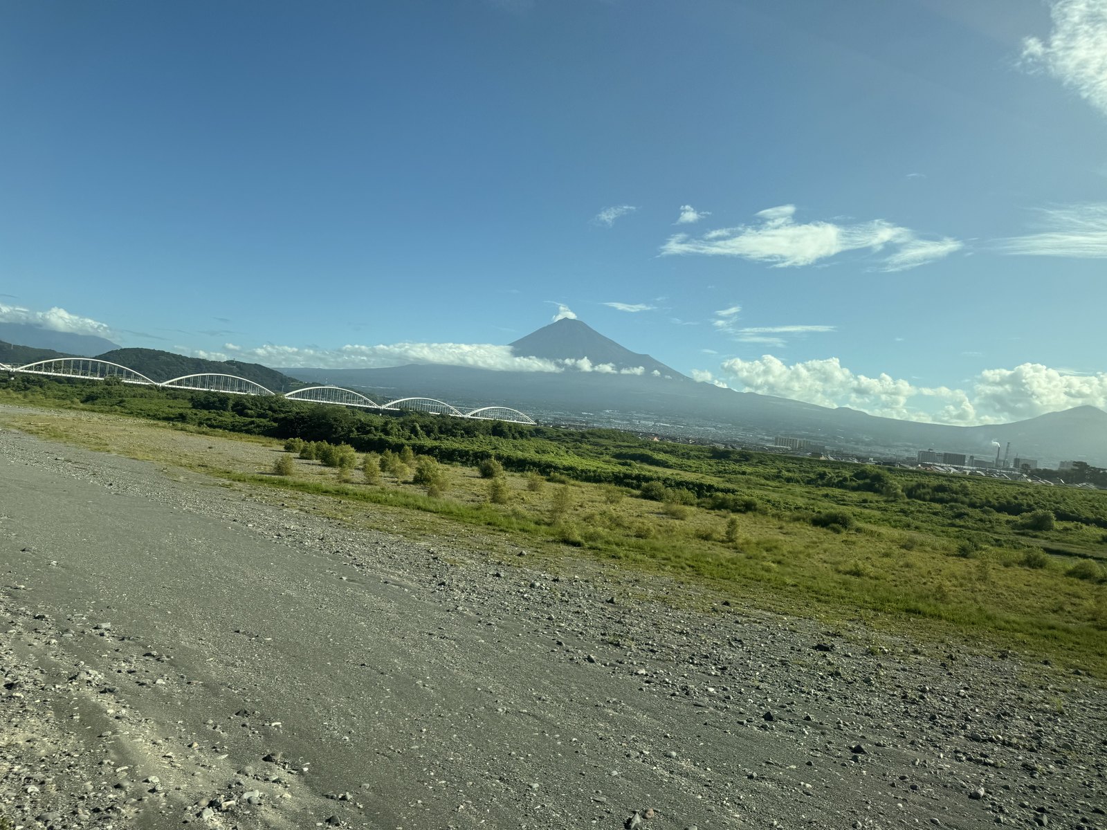 Mount Fuji seen from a Shinkansen window on a clear August morning